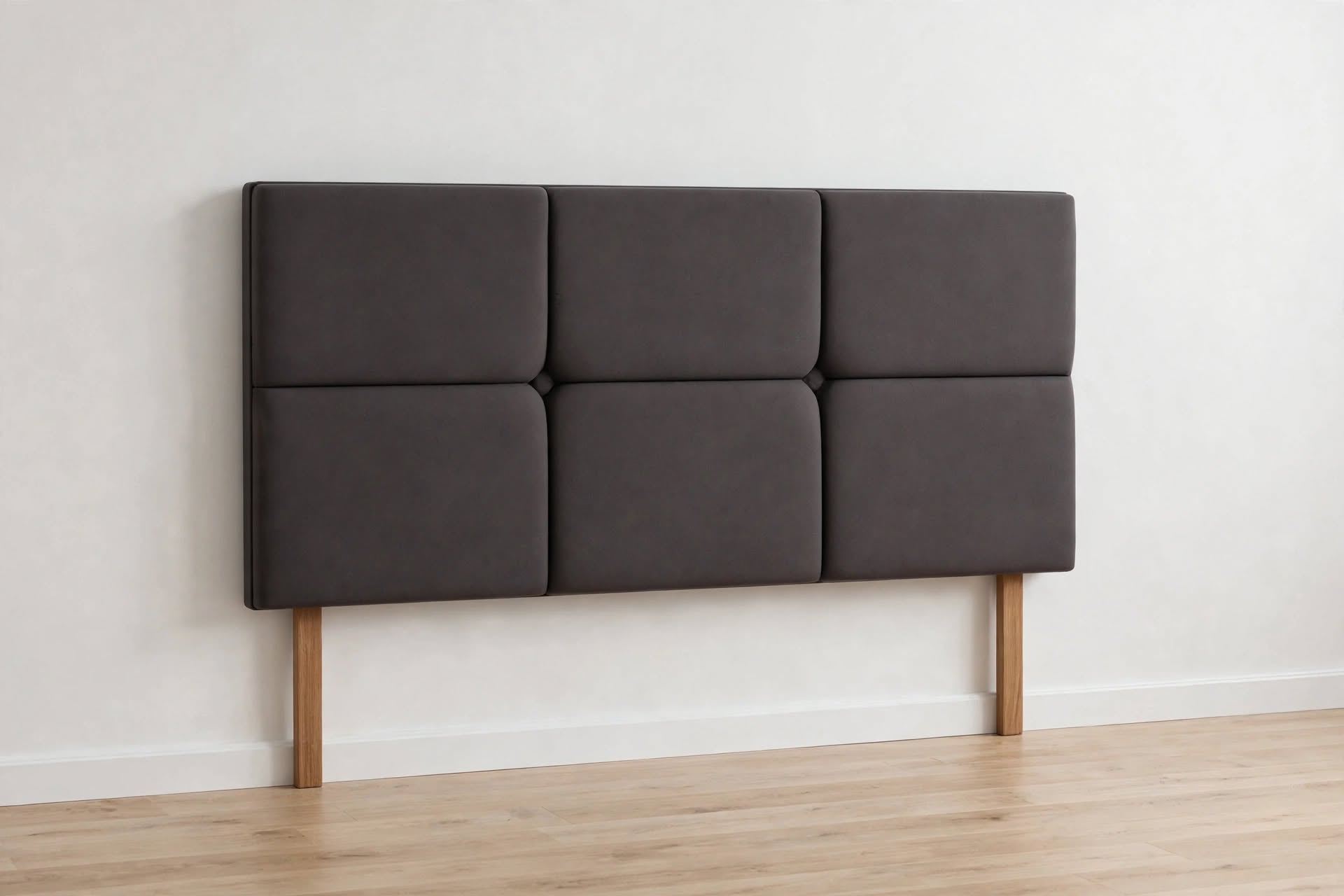 Castello charcoal padded headboard 180cm against bedroom wall - St James Bed Centre King's Lynn