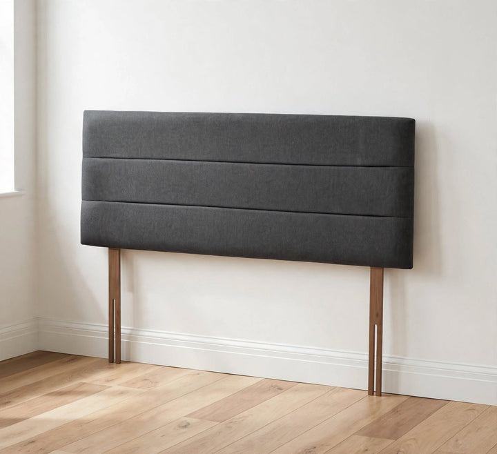 Charcoal grey 3 line panel fabric headboard with brown strutted legs and adjustment slots - St James Beds