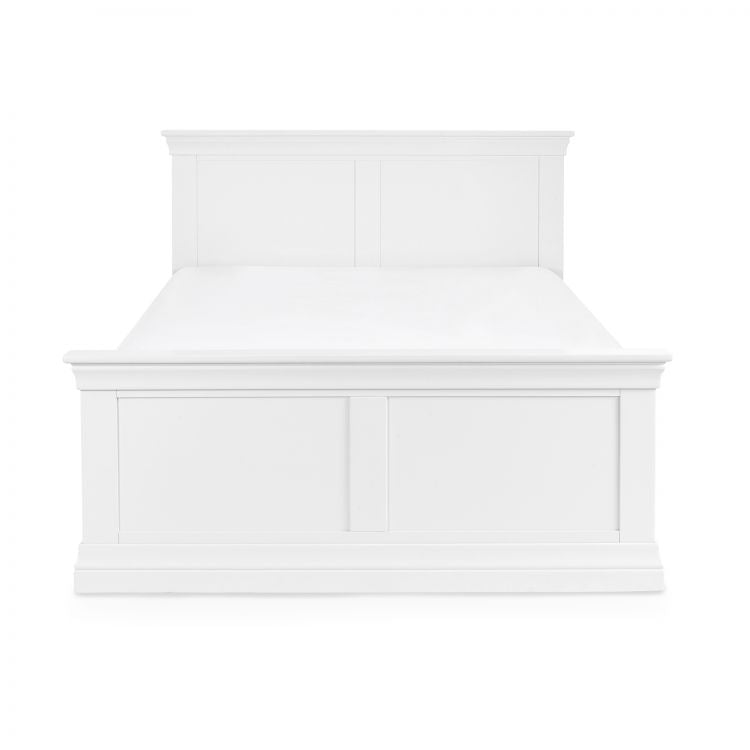 Clermont bed in White finish showing top-tapered cornices and cut-out plinth base