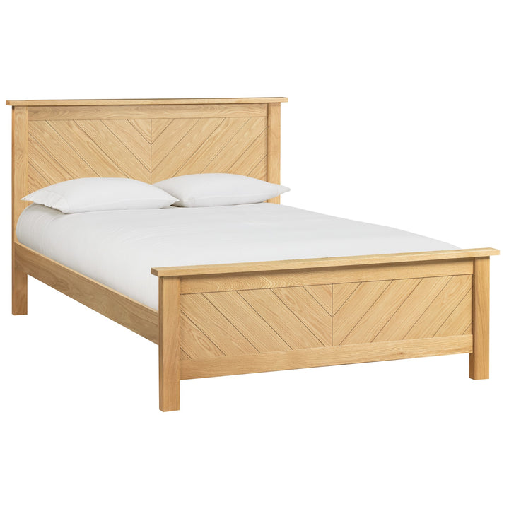 Kenji Oak bed frame with flowing chevron design in solid American Oak