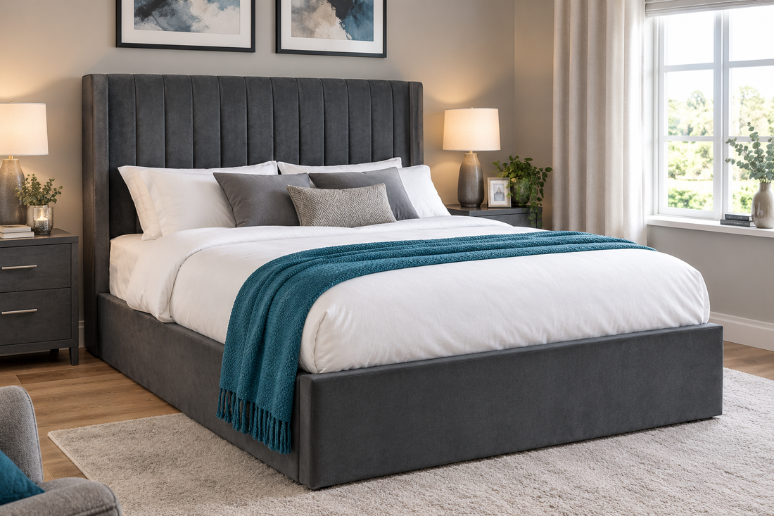 Langham grey upholstered storage bed with luxury scalloped headboard, styled in a modern bedroom – St James Bed Centre.