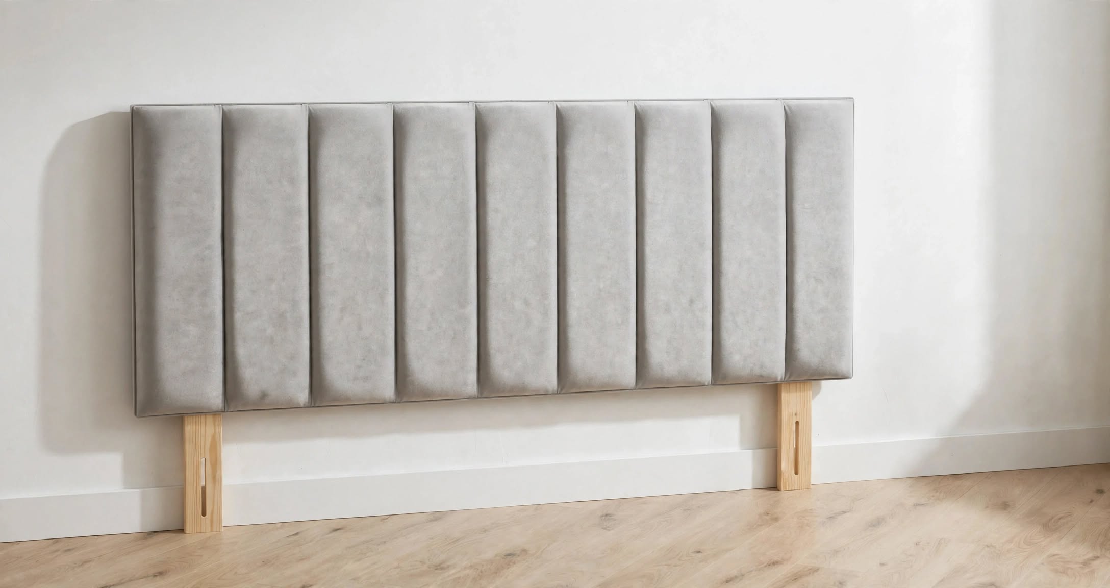 Light grey vertical panel fabric headboard with light pine strutted legs with adjustment slots - St James Beds