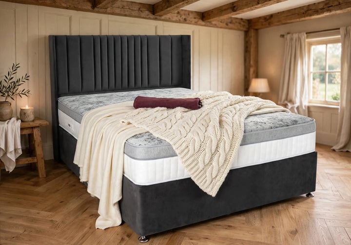 Offiah Activ Support firm graphene mattress with dark grey velvet divan base and tall fluted headboard styled with luxury cream throw in country style bedroom - St James Beds King's Lynn