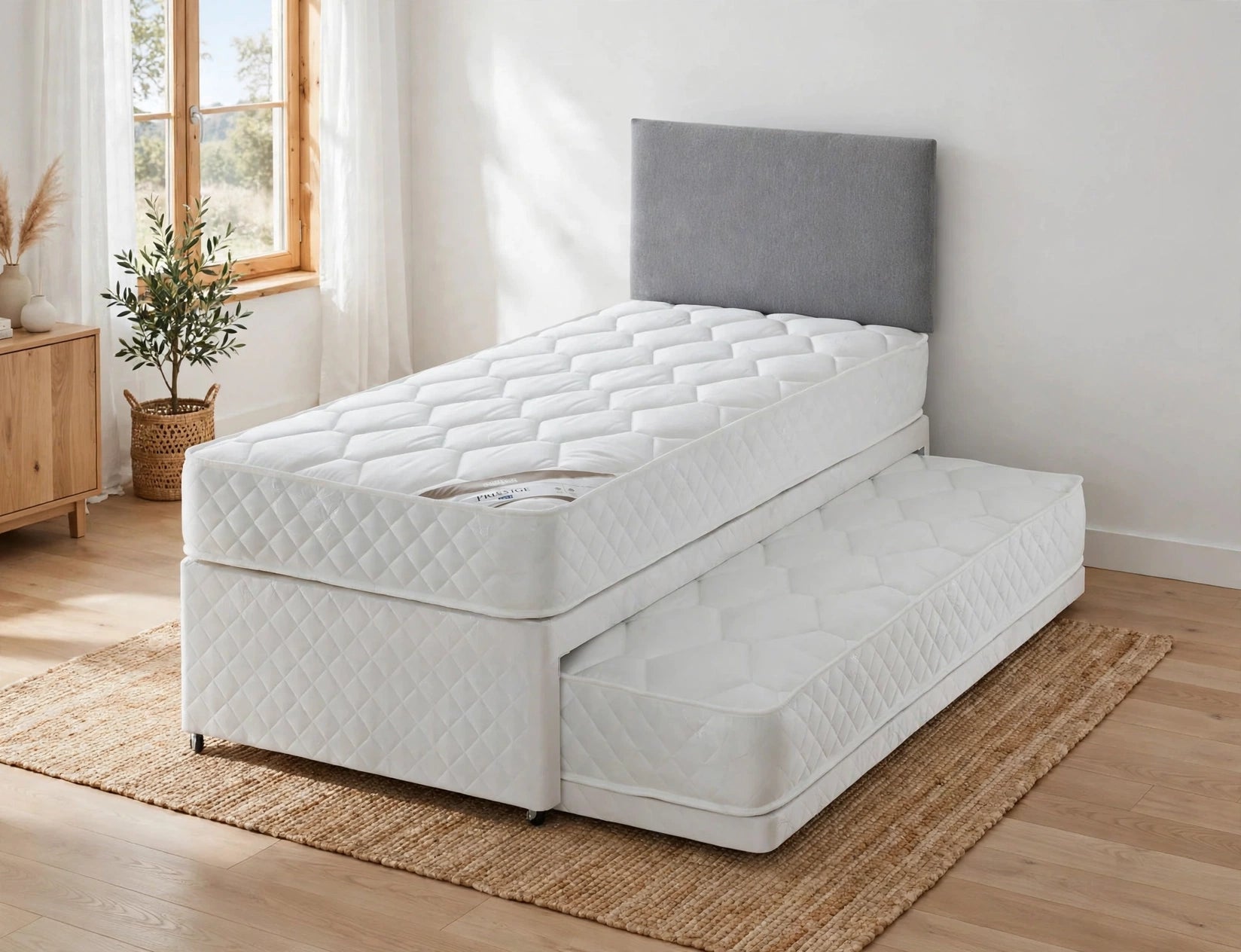 Prestige Visitor Set single divan bed with grey headboard white quilted mattress and pull-out trundle guest bed with second mattress - St James Beds