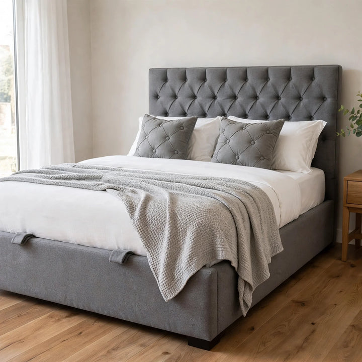 Truro deep buttoned ottoman bed in modern bedroom with white mattress pillows and throw - St James