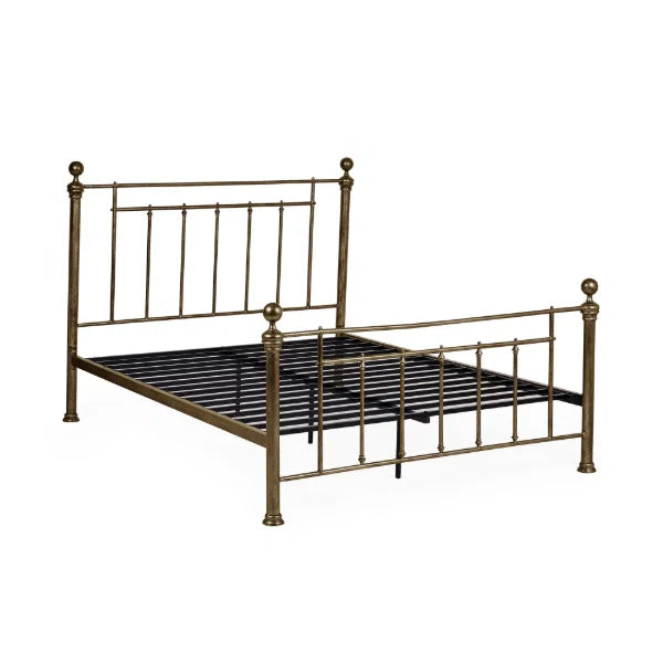 St James Bed Centre Aurelia brass effect bedstead with sleek metal frame and classic design, shown in a modern bedroom setting.